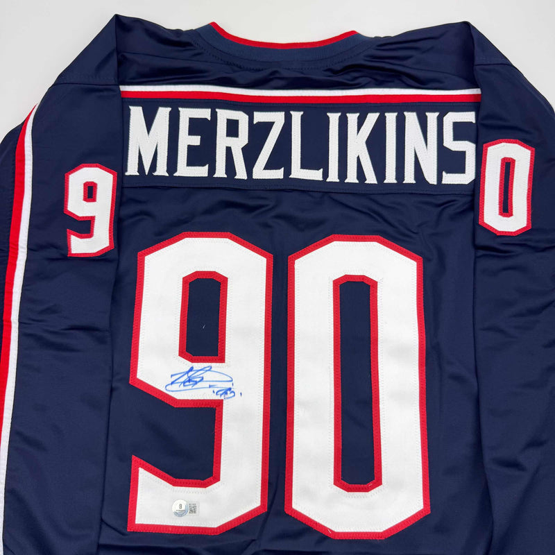 Autographed/Signed Elvis Merzlikins Columbus Blue Hockey Jersey Beckett BAS COA