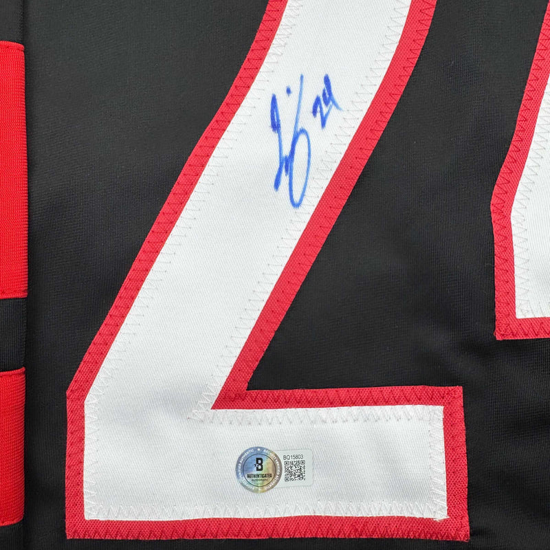 Autographed/Signed Seth Jarvis Carolina Black Hockey Jersey Beckett BAS COA