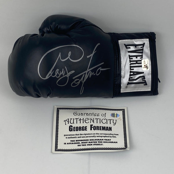 Autographed/Signed George Foreman Black Everlast Boxing Glove Athlete Hologram COA