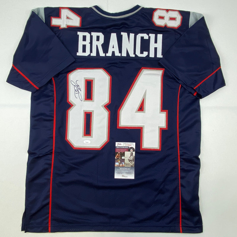 Autographed/Signed Deion Branch #84 New England Blue Football Jersey JSA COA