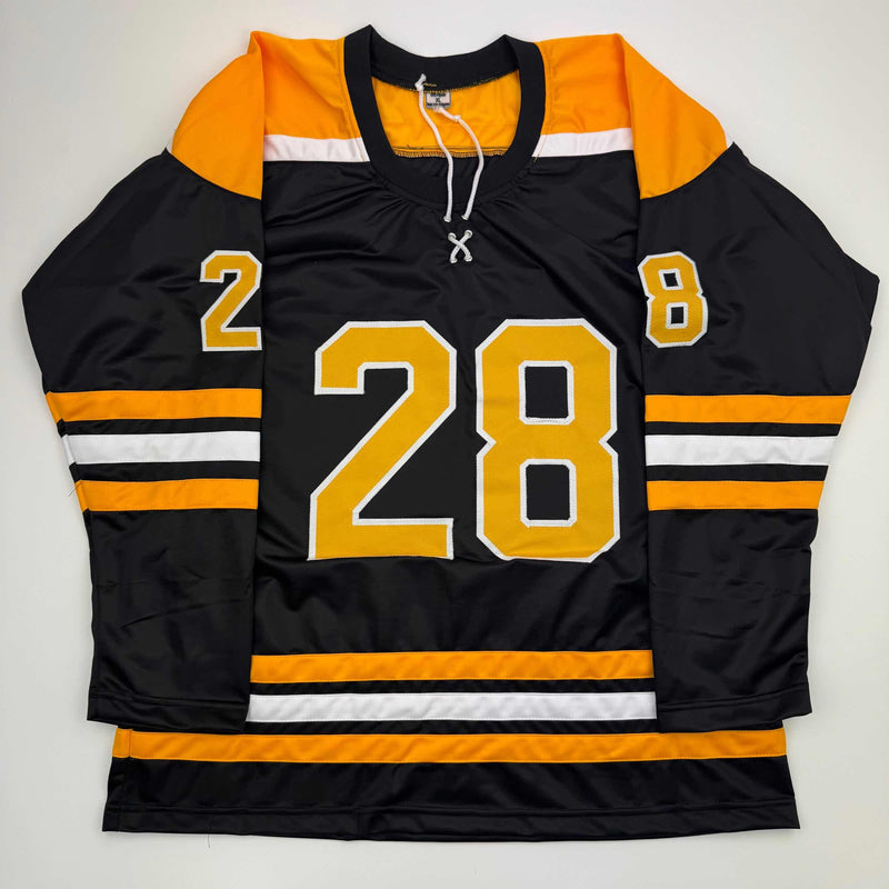 Autographed/Signed Elias Lindholm Boston Black Hockey Jersey JSA COA