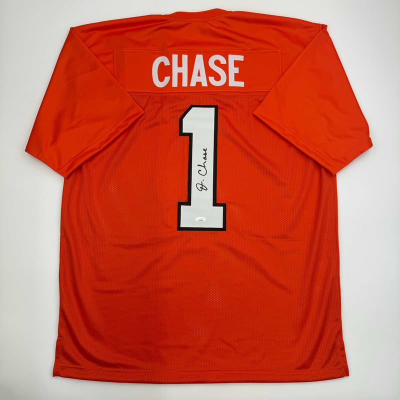 Autographed/Signed Ja'Marr Chase Cincinnati Orange Football Jersey JSA COA
