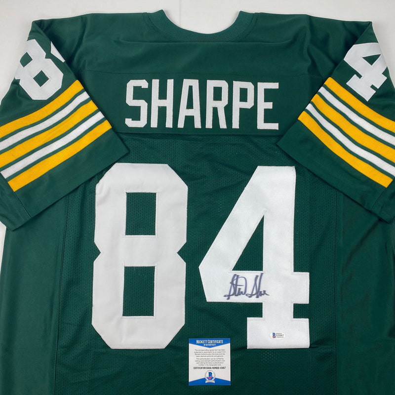 Autographed/Signed Sterling Sharpe Green Bay Green Football Jersey Beckett BAS COA