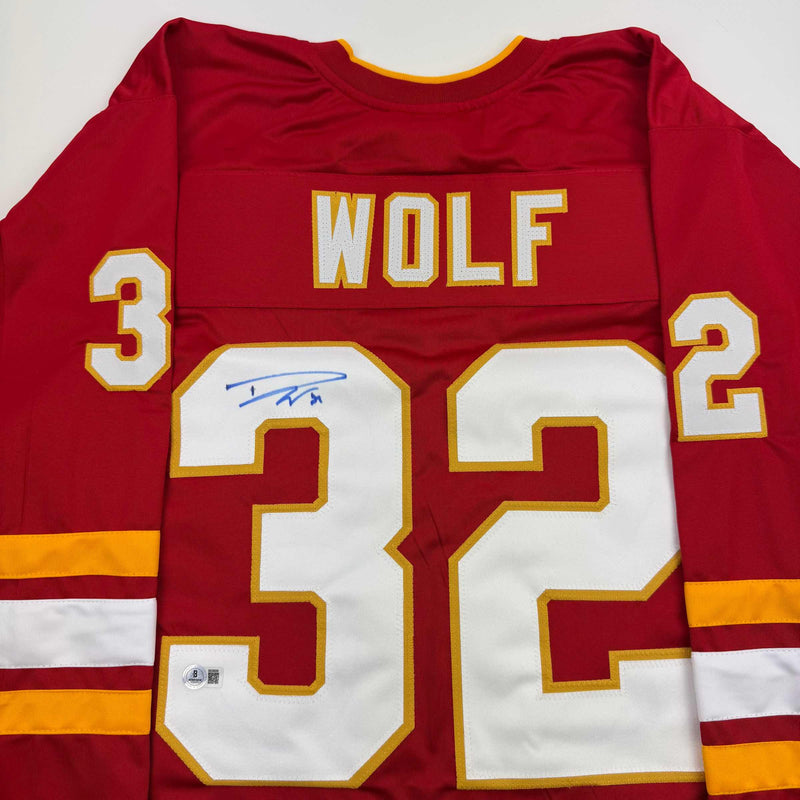 Autographed/Signed Dustin Wolf Calgary Red Hockey Jersey Beckett BAS COA