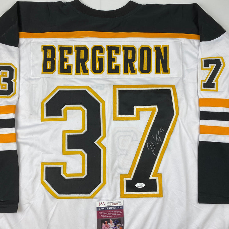 Autographed/Signed Patrice Bergeron Boston White Hockey Jersey JSA COA