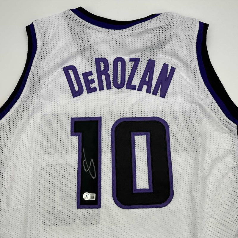 Autographed/Signed DeMar DeRozan Sacramento White Basketball Jersey Beckett BAS COA