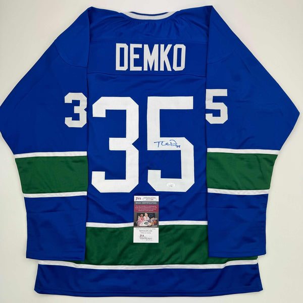 Autographed/Signed Thatcher Demko Vancouver Blue Hockey Jersey JSA COA
