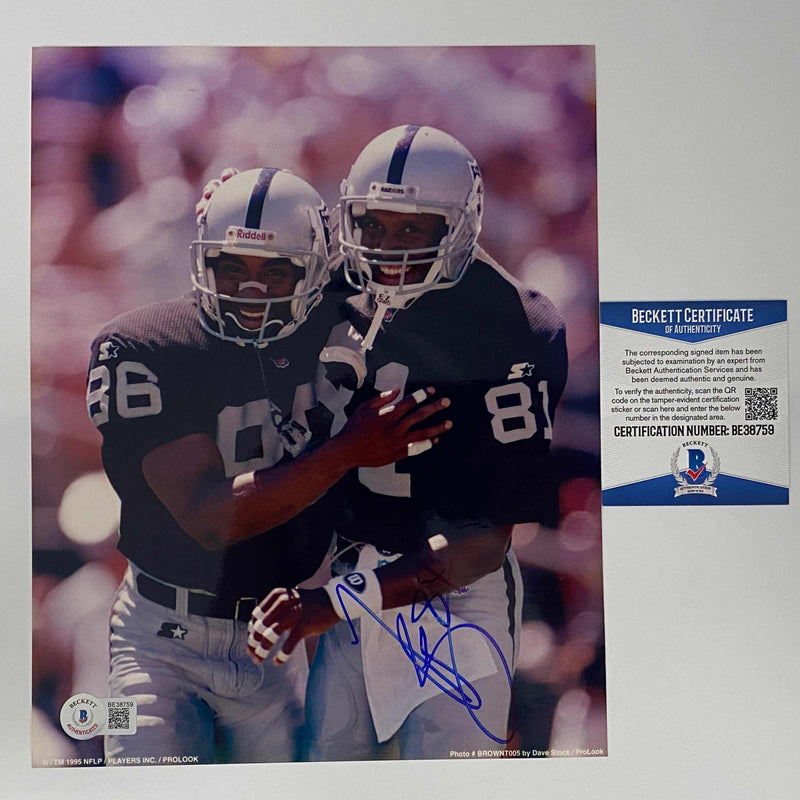 Autographed/Signed Tim Brown Las Vegas Oakland Raiders 8x10 Football Photo Beckett BAS COA #1