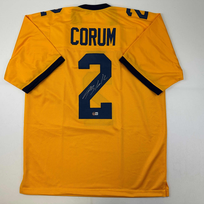 Autographed/Signed Blake Corum Michigan Yellow College Football Jersey Beckett BAS COA